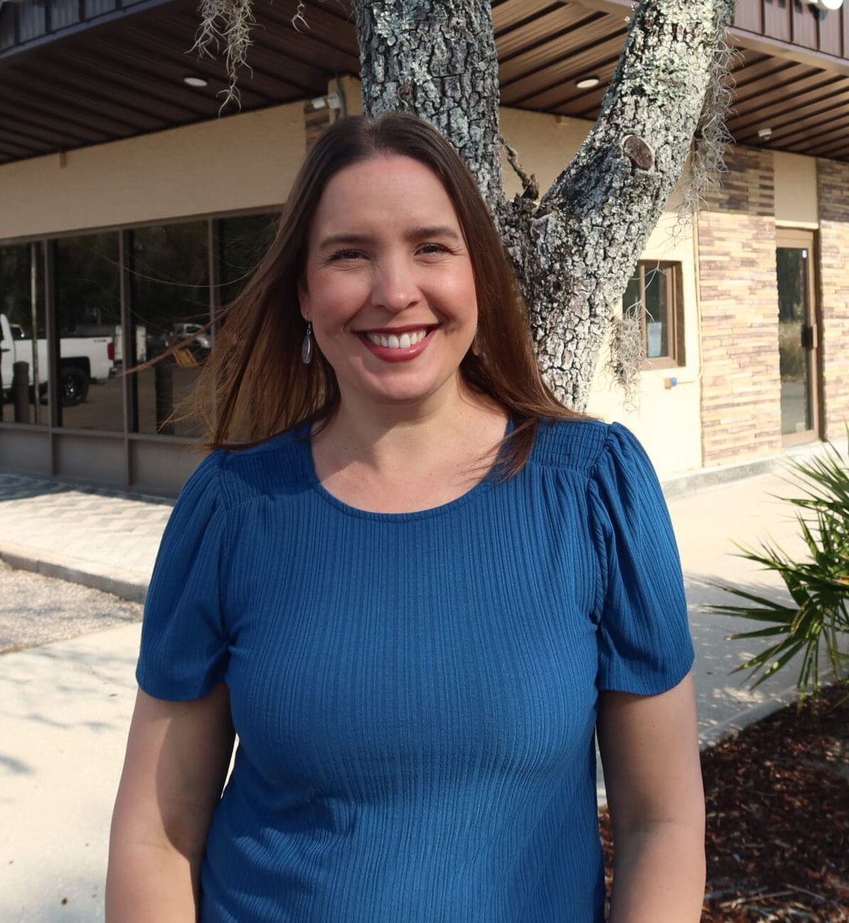 Profile picture of woman smiling at camera